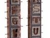 Twenty-Six Rusty Letters on Two Old Posts, 2010